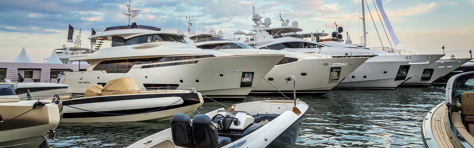 Luxury Yachts anchored in Port Pierre Canto at the Boulevard de la Croisette in Cannes, France. By Nadezda Murmakova