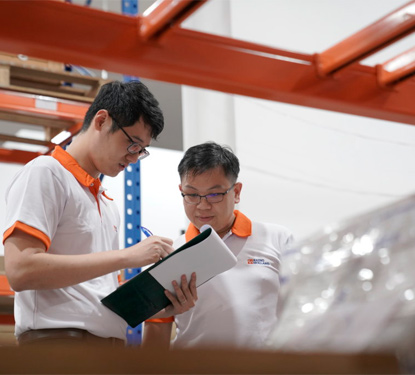 Radio Holland employees at the warehouse in Singapore