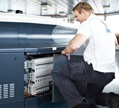 Technician at work on Navigation Bridge