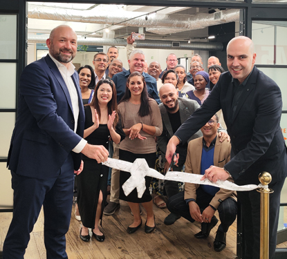 oachim de Jenlis (CCO Projects - Radio Holland Group) on the left and Faissel el Mouridi (CFO - Radio Holland Group) on the right, performing the official opening act of the new Radio Holland office in Cape Town.